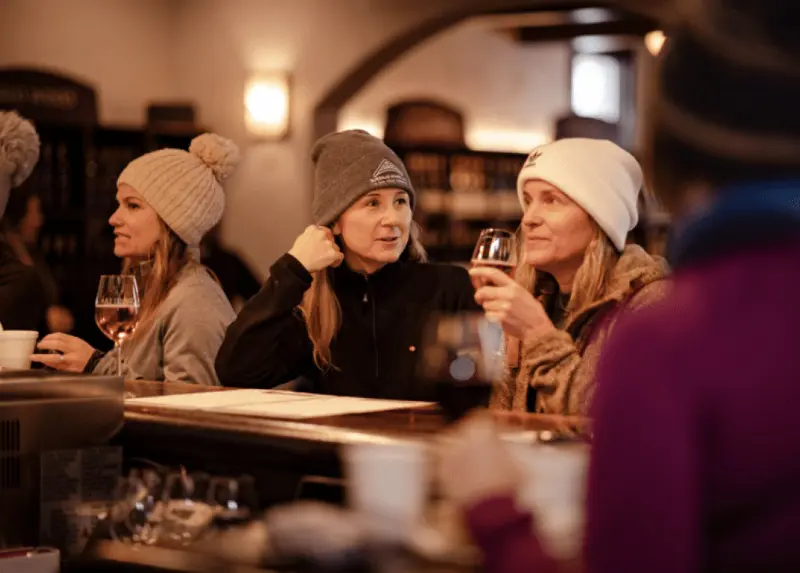 People drinking and enjoying vine at a private party venue in Lake Leelanau, MI